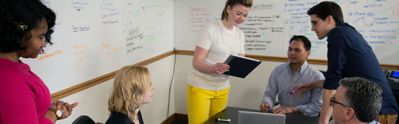 Photo of employees at work